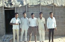 Camp Workers outside their home on Dubai outskirts. 10 Sqn Re