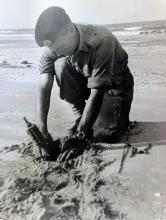 Corporal Stevens lifting mine Port Said 1956